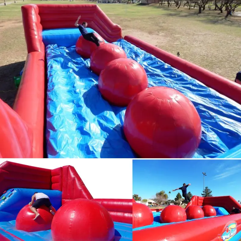 Colorful Wipe Out Inflatable , Leaps and Bounds Interactive Inflatable Big Baller Wipeout Challenge