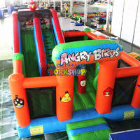 Inflatable bouncer castle with slide