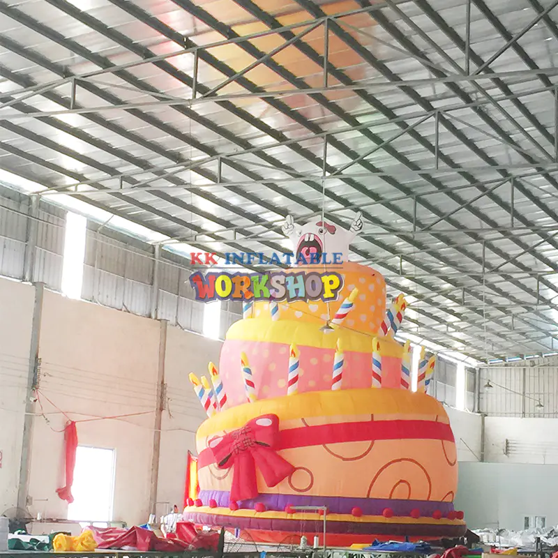 giant inflatable birthday cake with candles
