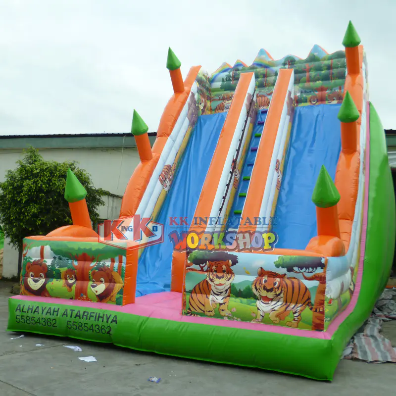Made in China large children's Jungle theme inflatable double slide, forest jumping castle dry slide